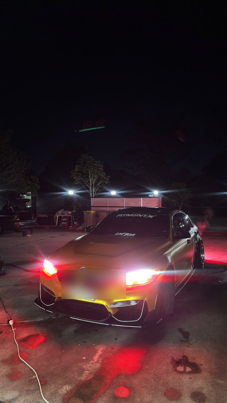 Modified BMW M4 after an evening detail