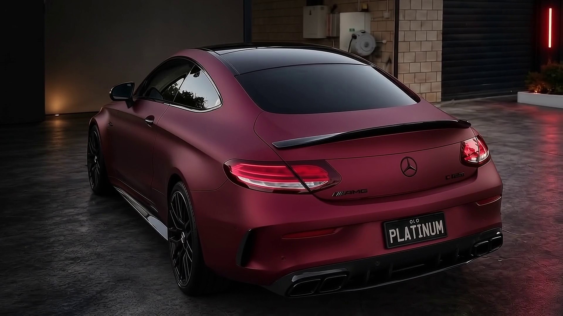 Matte burgundy Mercedes-AMG C63 S coupe, rear three-quarter view, camera orbiting to the front