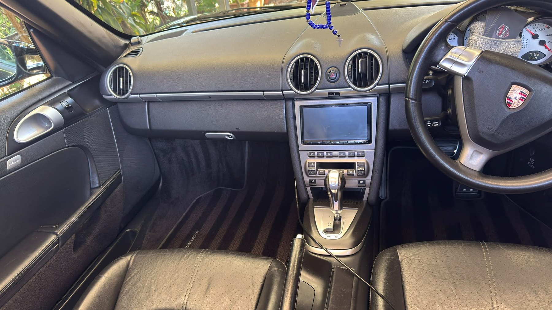 Car interior with a Platinum Car Care branded steering wheel cover